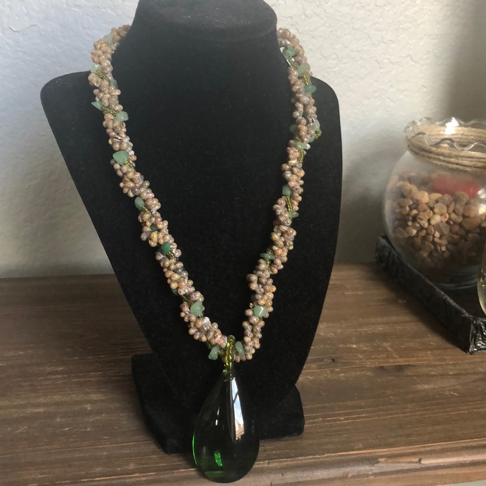 Beautiful necklace made of stone and snail shells